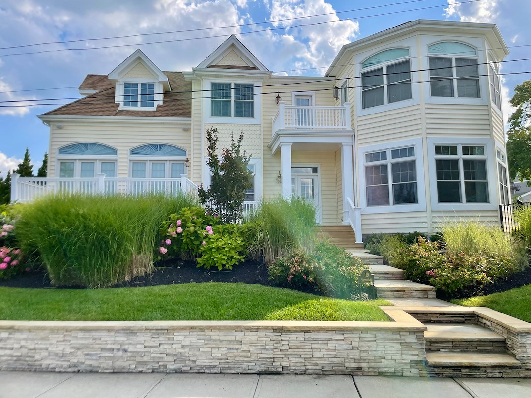 Manasquan NJ Coastal Restoration: 3-Story House Wash, Pergola Soft Wash & Paver Stone Reset Image